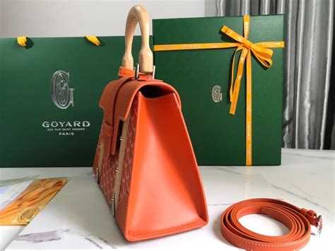 worn orange goyard|goyard saigon bag.